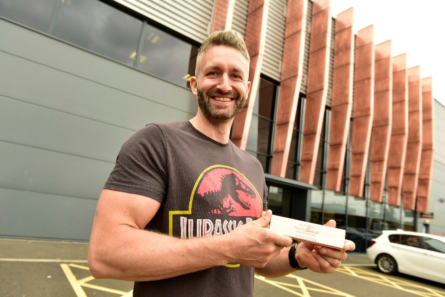 Peter Booth stands outside the Lawton Tubes factory