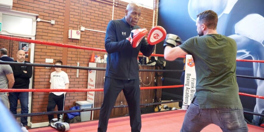 Frank Bruno coaching in the ring at the Frank Bruno Boxing Academy