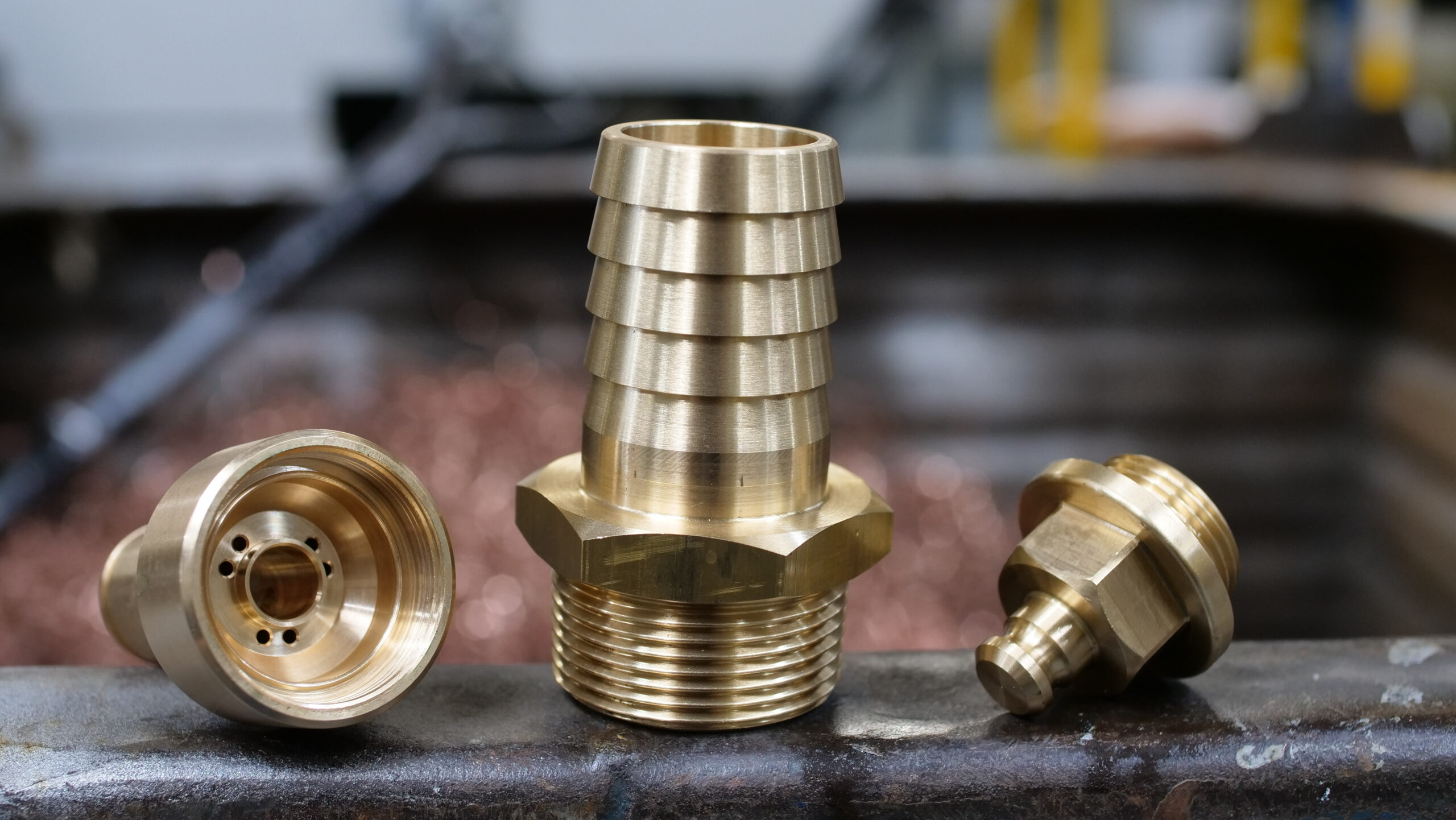 What is dezincification of brass and how does brass corrosion affect specialist water fittings?